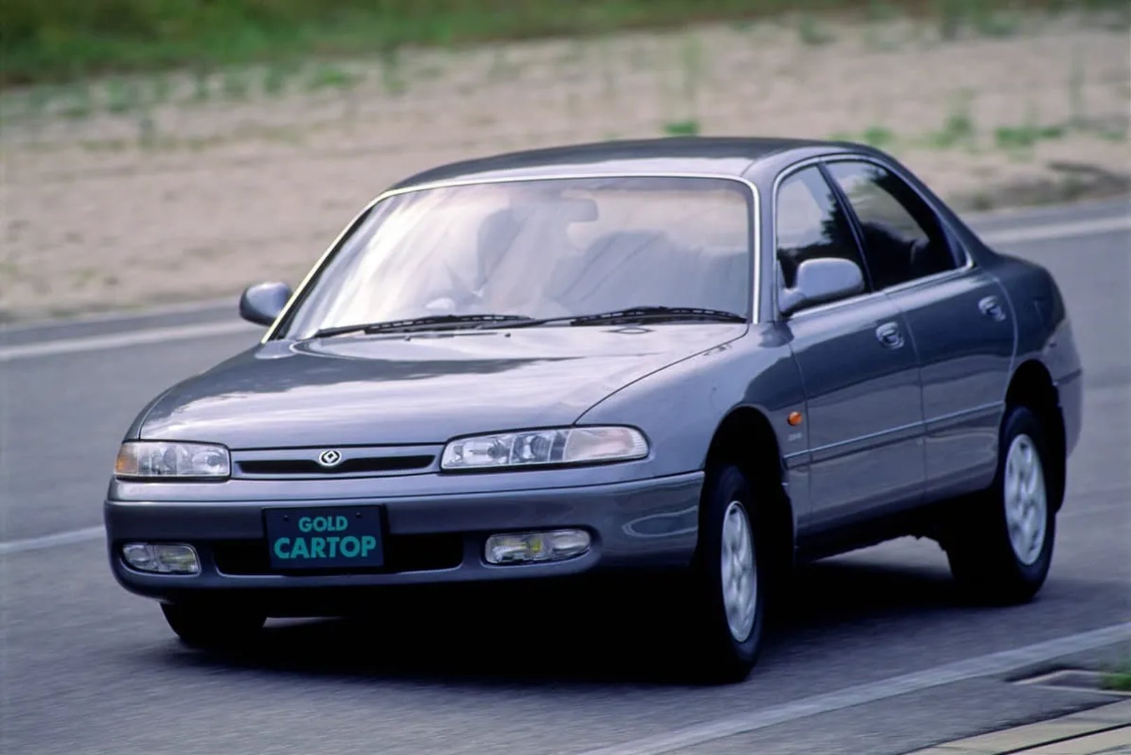 Mazda_Cronos_1_generation__Sedan__2.jpg
