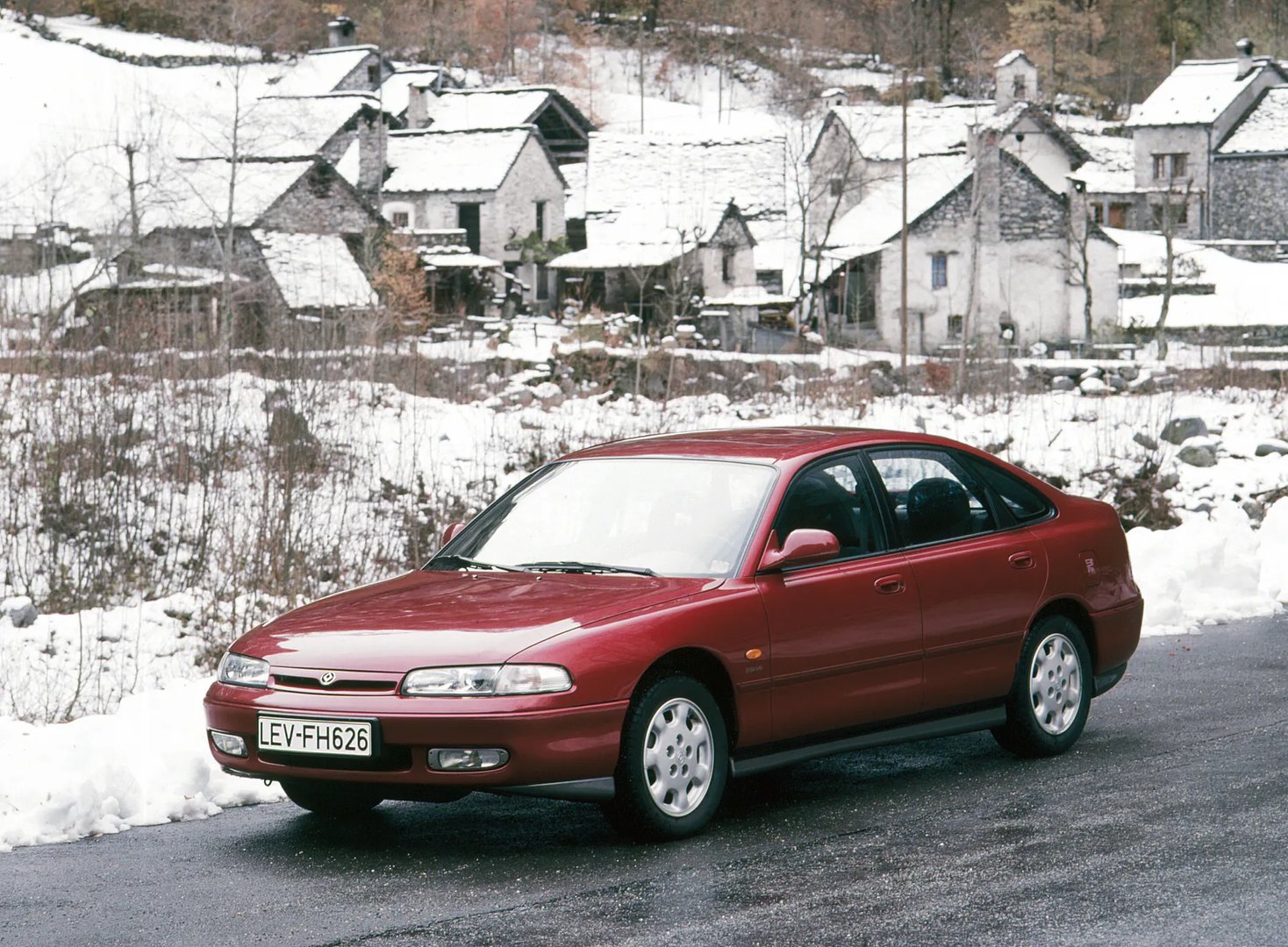 Mazda_626_4_generation__Hatchback_5-door__1.jpg