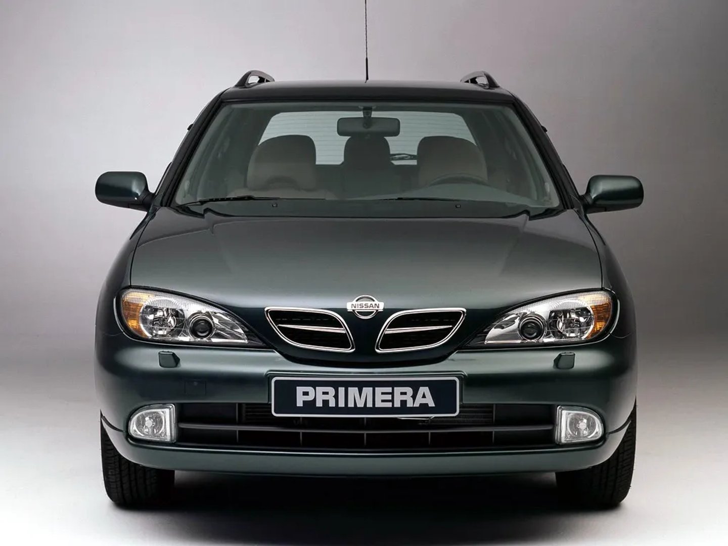 Nissan_Primera_2_generation_restyling__Estate_5-door__4.jpg