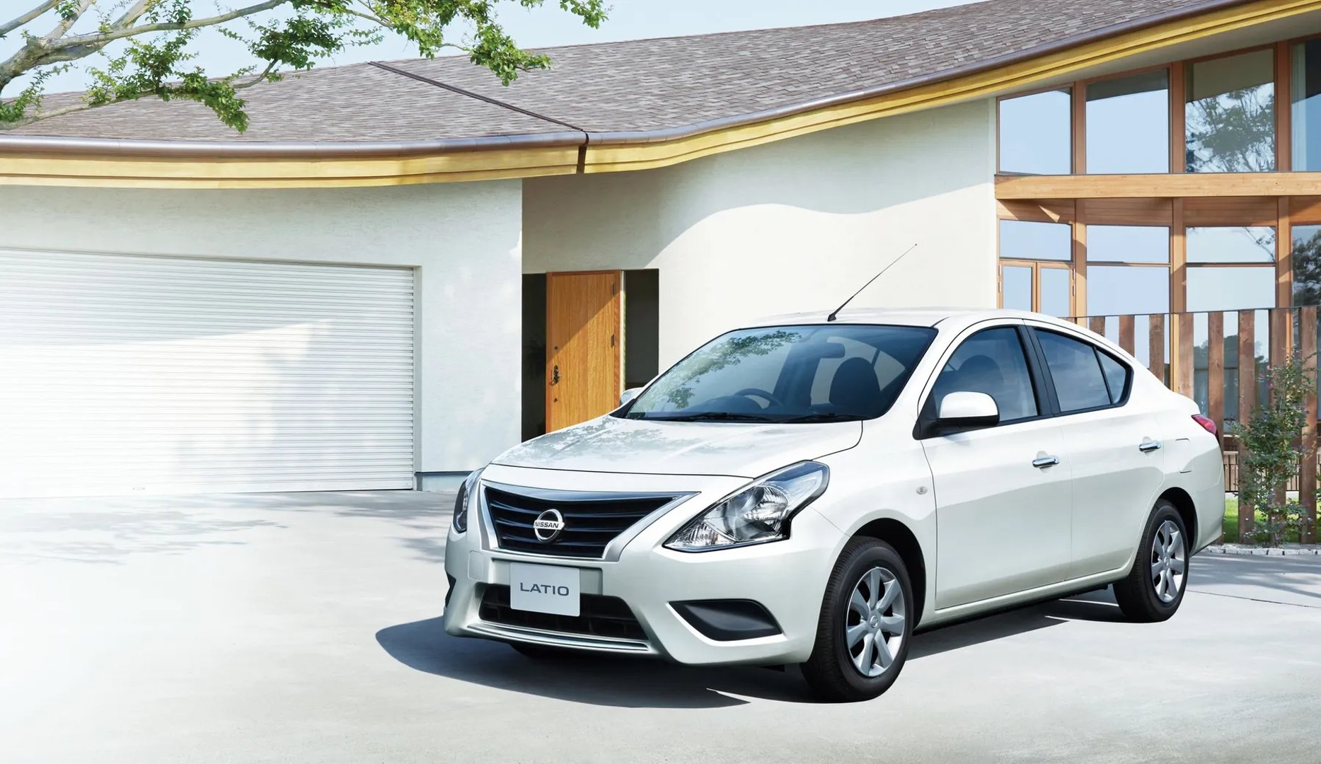 Nissan_Latio_1_generation_restyling__Sedan__1.jpg