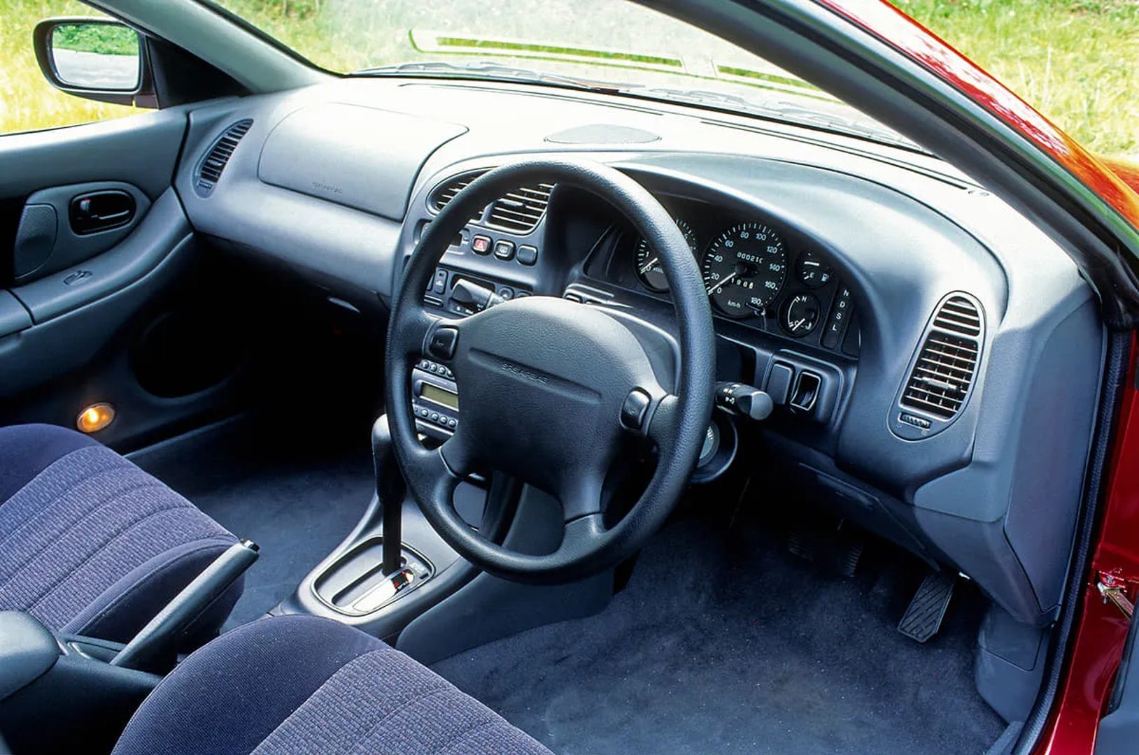 Mazda_Lantis_1_generation__Hatchback_5-door__6.jpg