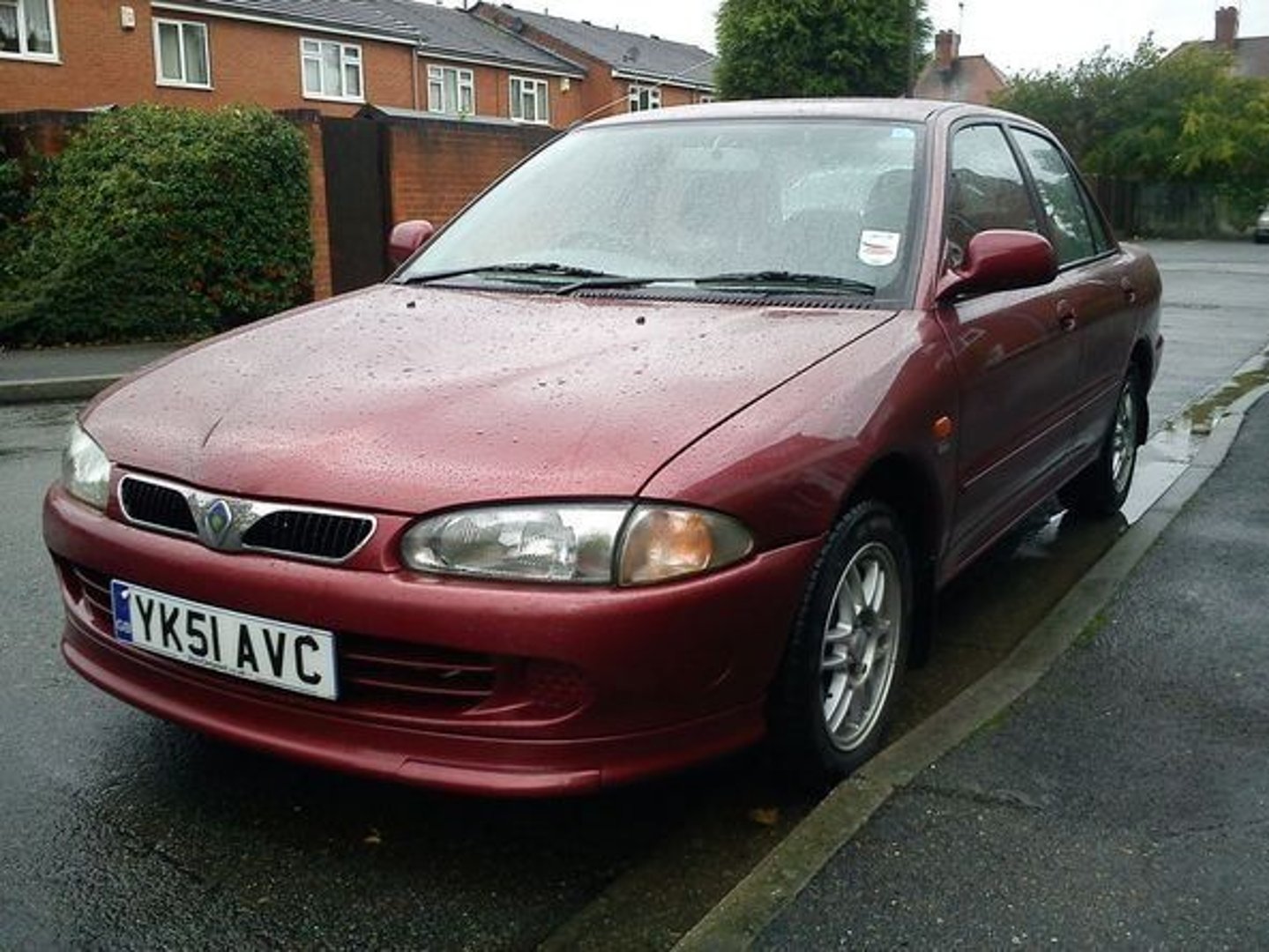 proton_Wira_1_generation__Sedan__1.jpg