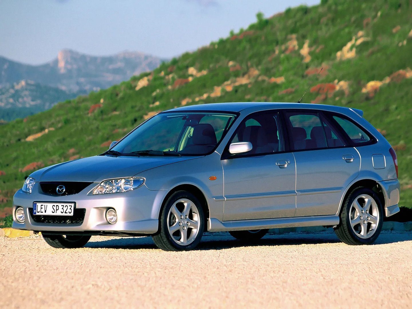 Mazda_323_Lantis_6_generation_restyling__Hatchback_5-door__8.jpg