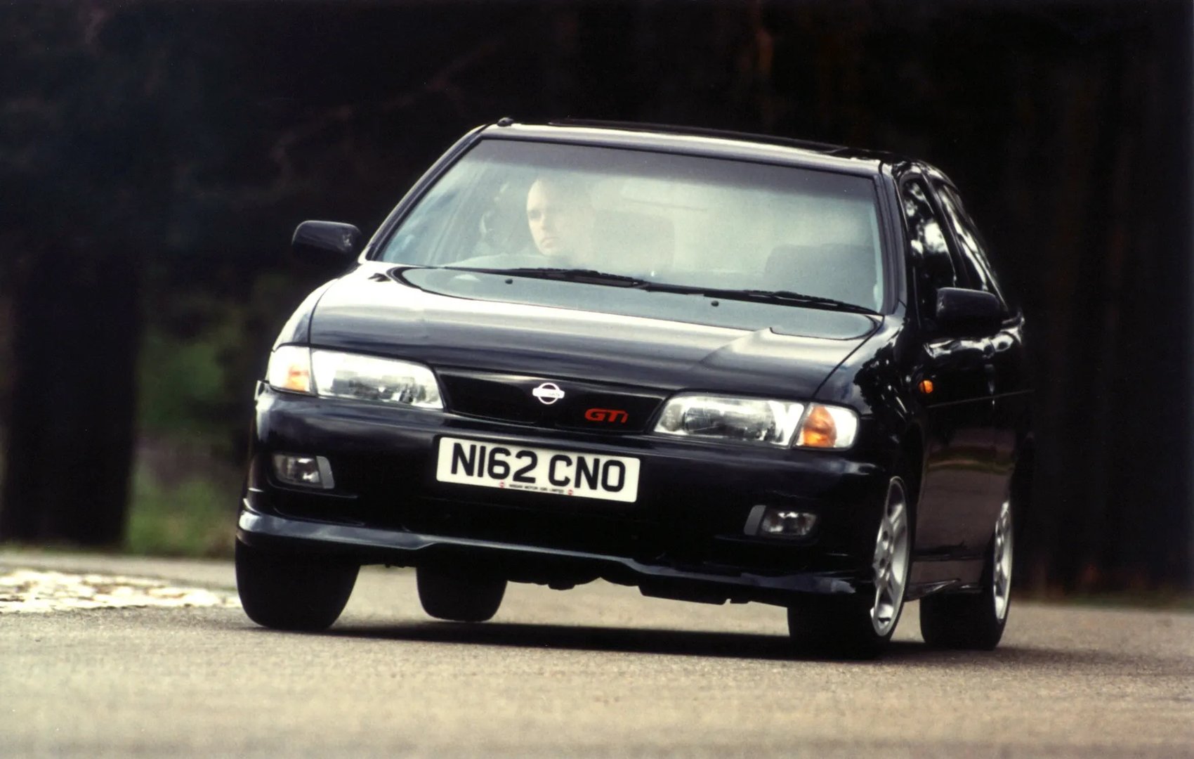 Nissan_Almera_1_generation__Hatchback_3-door__2.jpg