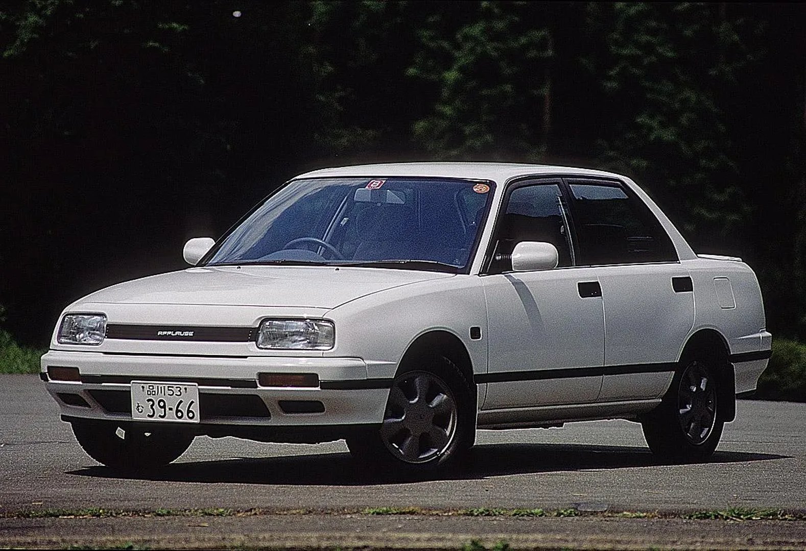 Daihatsu_Applause_1_generation__Liftback__main.jpg