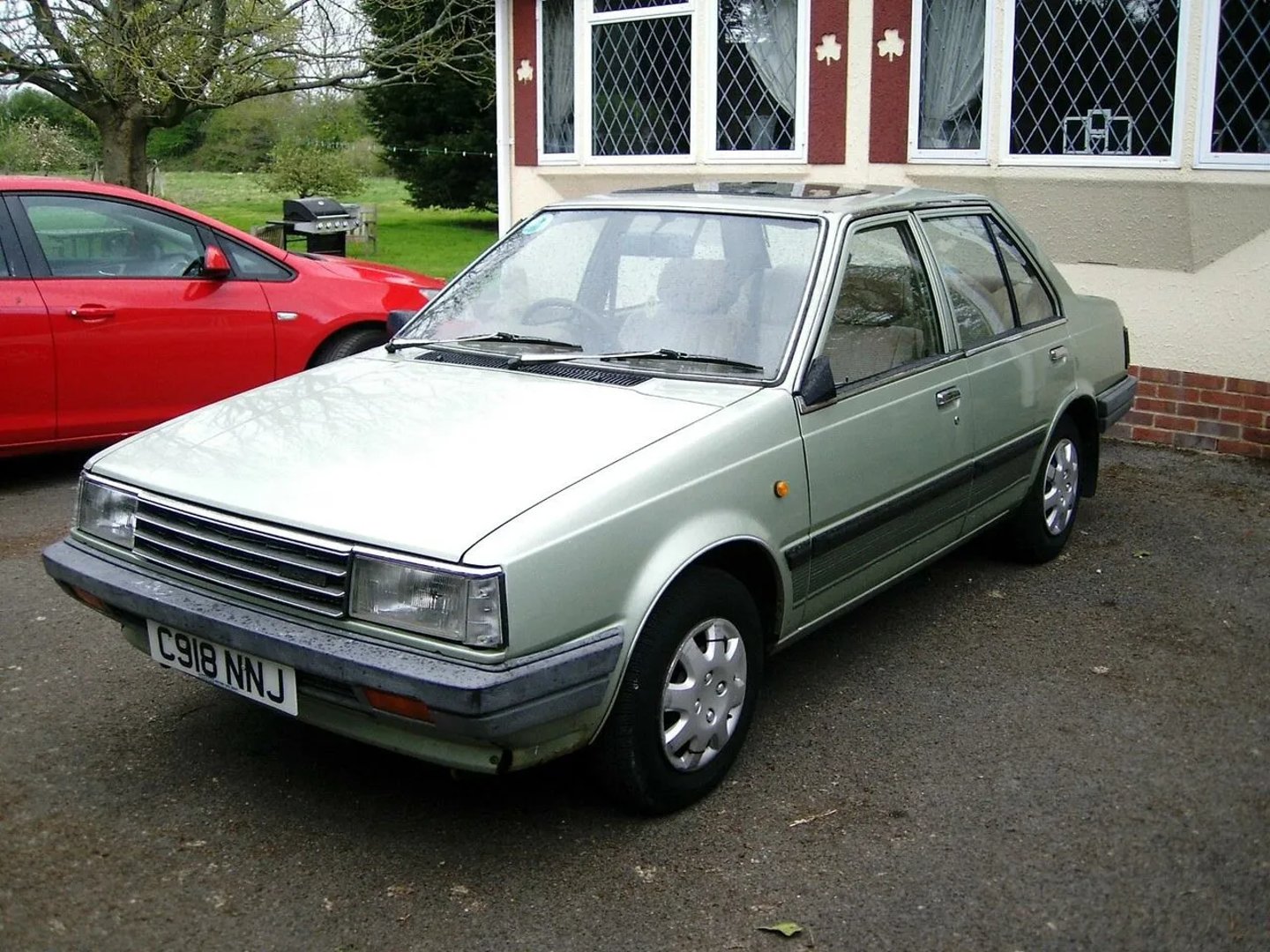 Nissan_Sentra_1_generation__Sedan__1.jpg