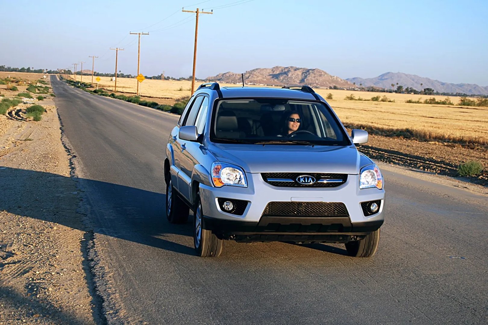Kia_Sportage_2_generation_restyling__SUV_5-doors__7.jpg