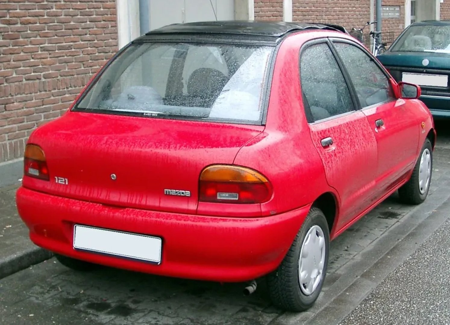 Mazda_Revue_1_generation__Sedan__4.jpg