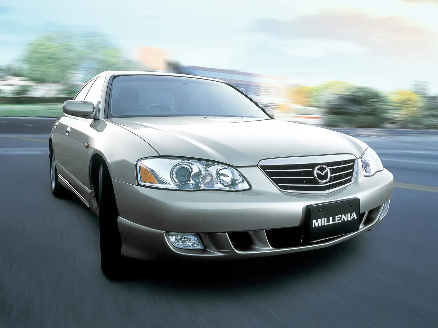 Mazda_Millenia_1_generation_restyling__Sedan__2.jpg