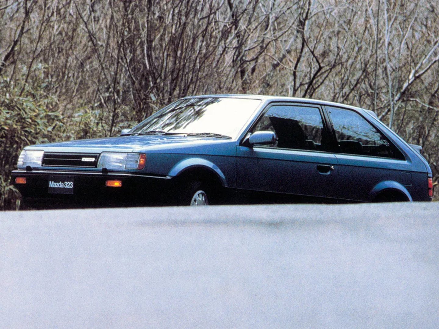 Mazda_323_Lantis_3_generation__Hatchback_3-door__6.jpg