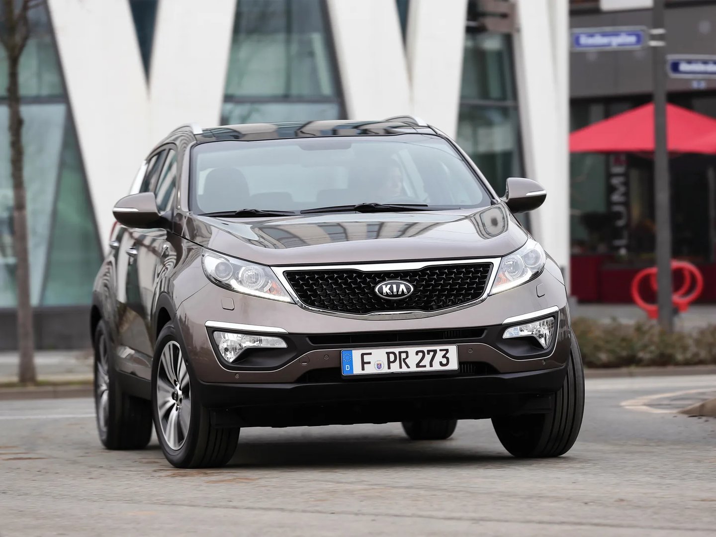 Kia_Sportage_3_generation_restyling__SUV_5-doors__1.jpg