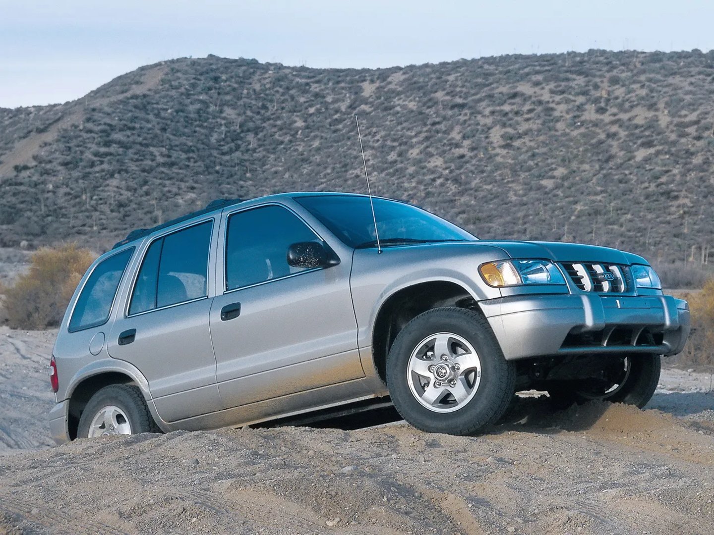 Kia_Sportage_1_generation__SUV_5-doors__2.jpg