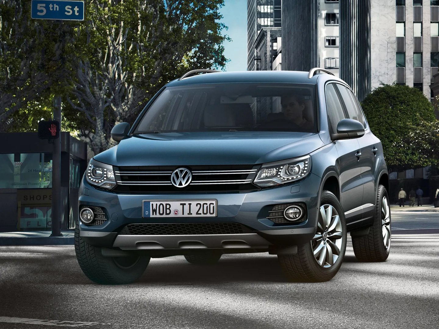 Volkswagen_Tiguan_1_generation_restyling__SUV_5-doors__main.jpg