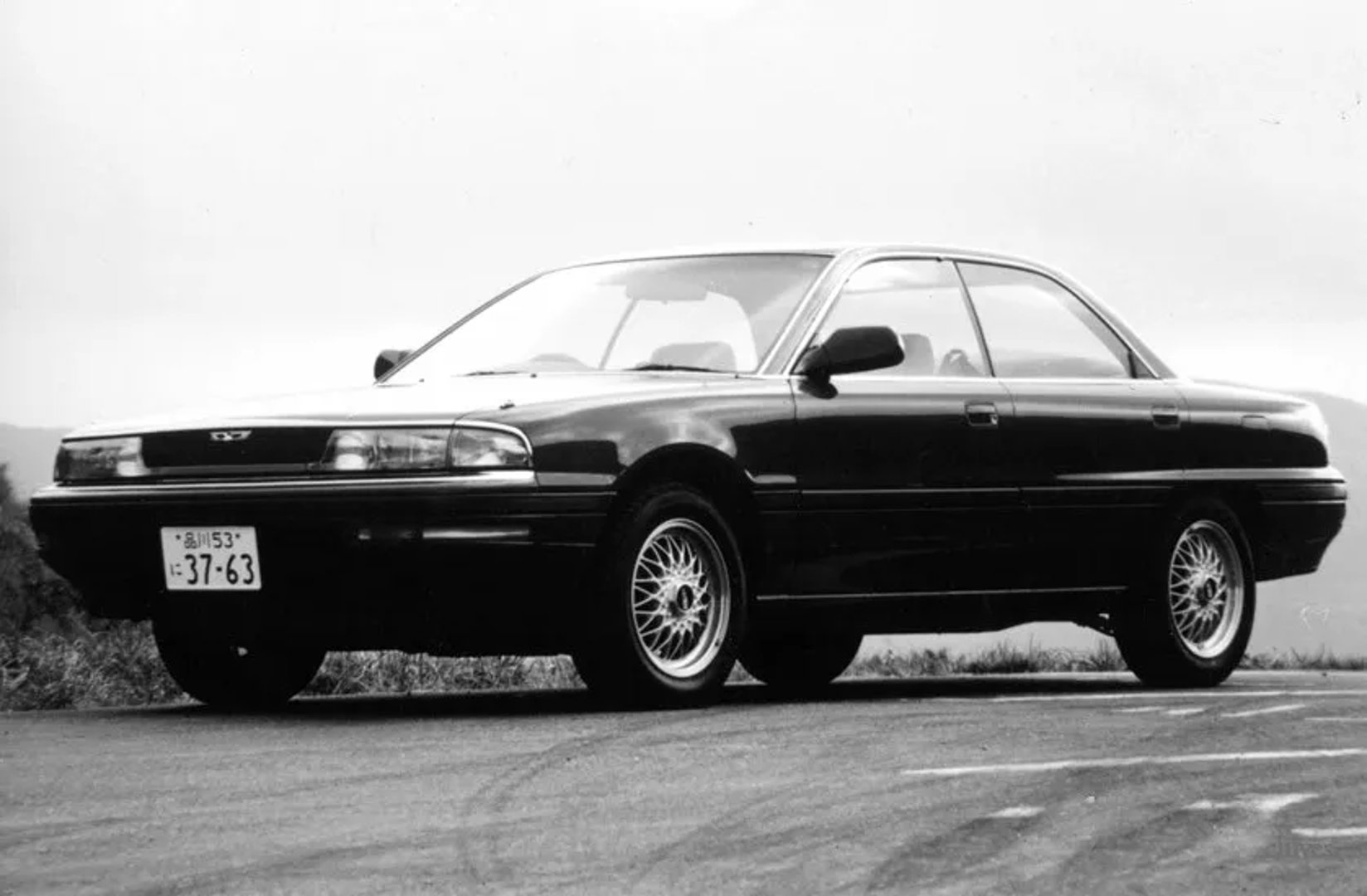 Mazda_Persona_1_generation__Sedan__2.jpg