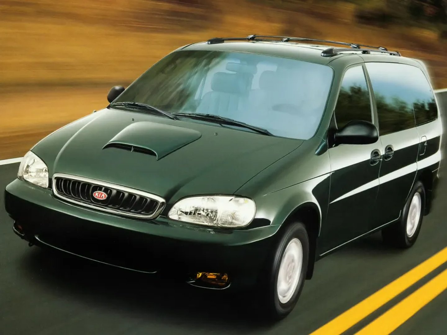 Kia_Carnival_1_generation__Minivan__3.jpg