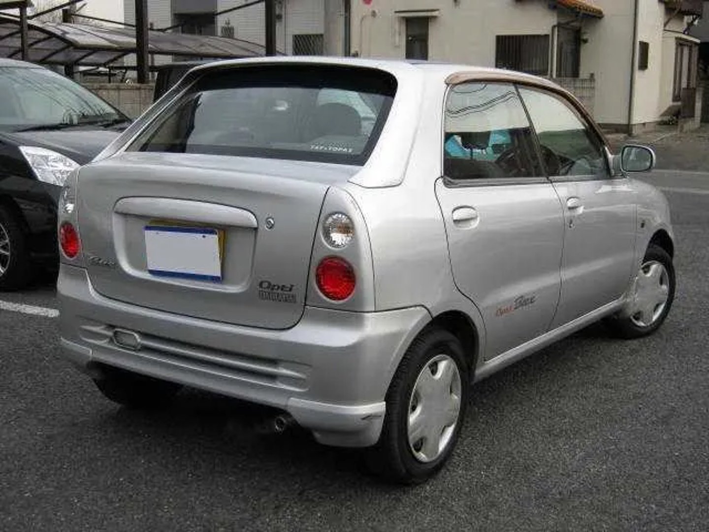 Daihatsu_Opti_2_generation__Sedan__3.jpg