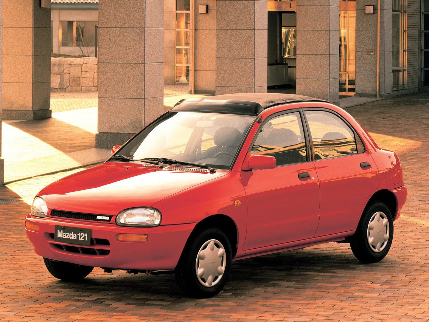 Mazda_121_2_generation__Sedan__1.jpg