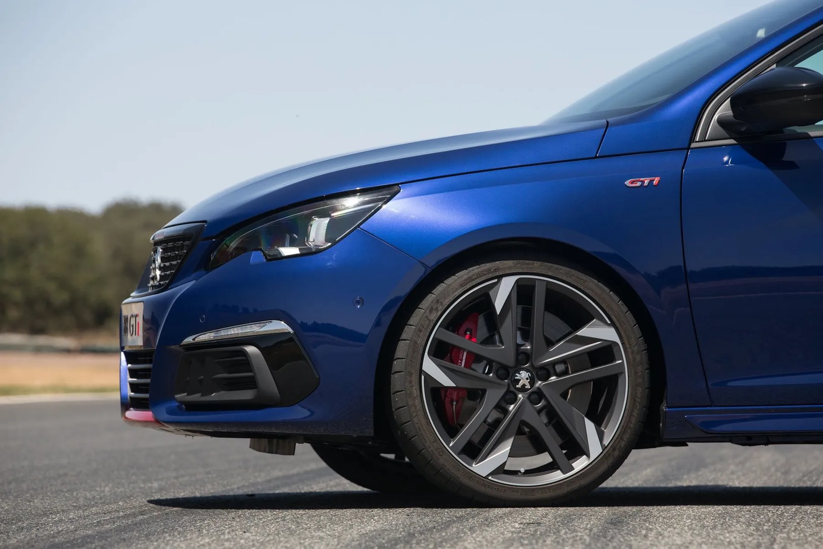 Peugeot_308_GTi_1_generation_restyling__Hatchback_5-door__9.jpg