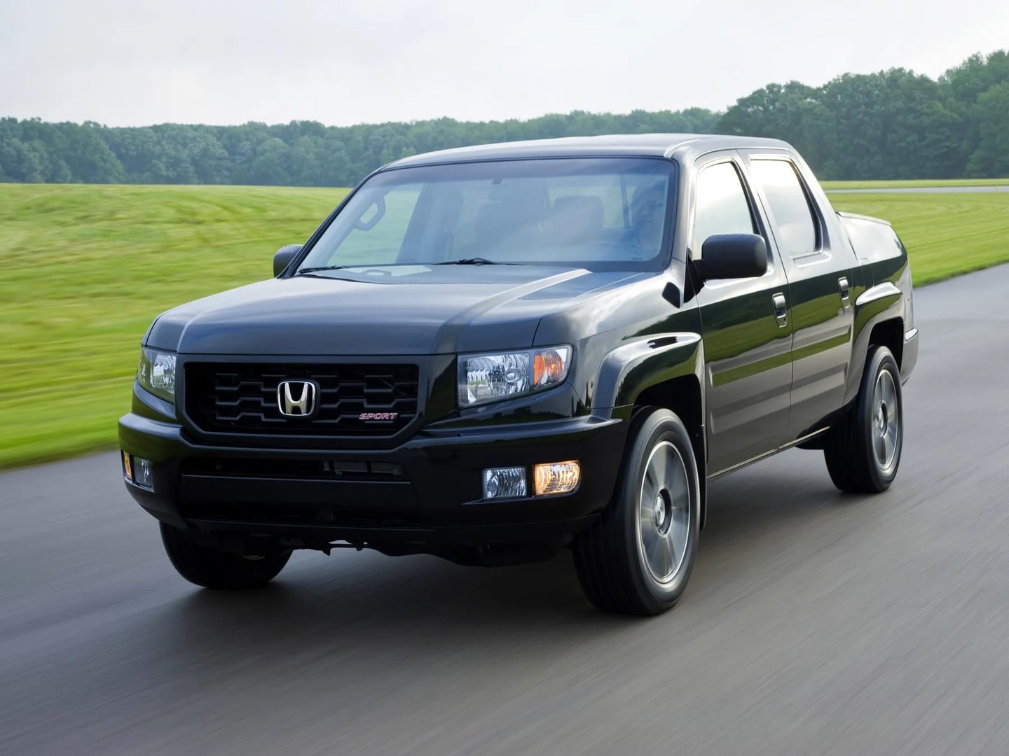 Honda_Ridgeline_1_generation_restyling_2__Pickup_double-cab__1.jpg