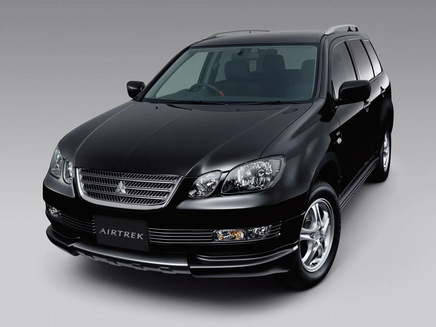 Mitsubishi_Airtrek_1_generation__SUV_5-doors__8.jpg