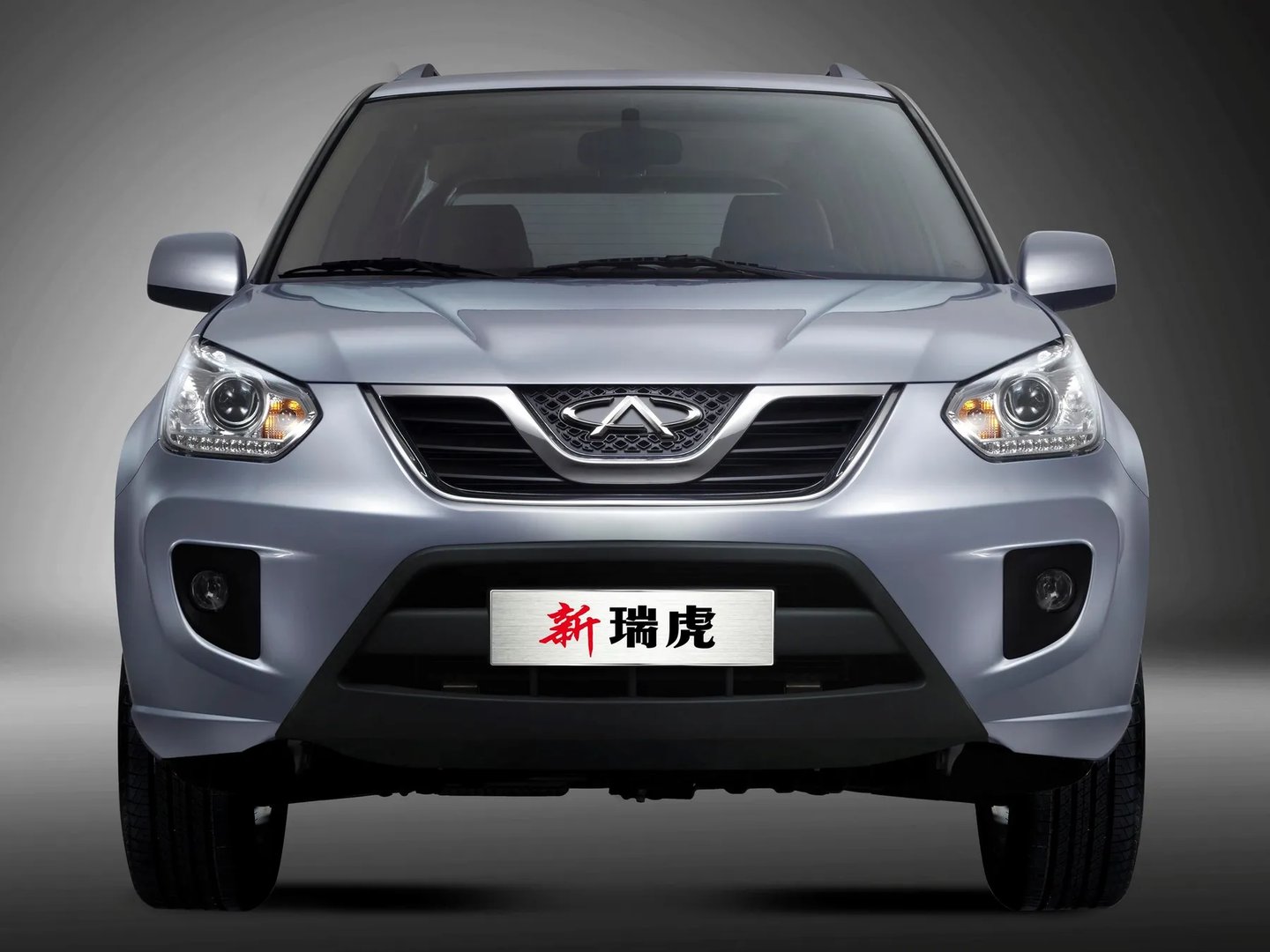 Chery_Tiggo_(T11)_1_generation_restyling__SUV_5-doors__6.jpg