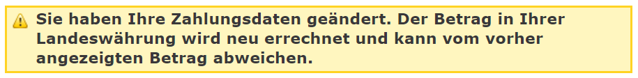 Beispiel für eine Warnmeldung, die erklärt, wie der Betrag in lokaler Währung neu berechnet wurde, weil die Kartendaten aktualisiert wurden.