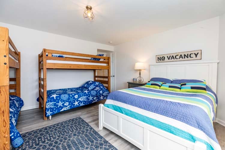 1st Floor Queen & Twin Bunks Bedroom