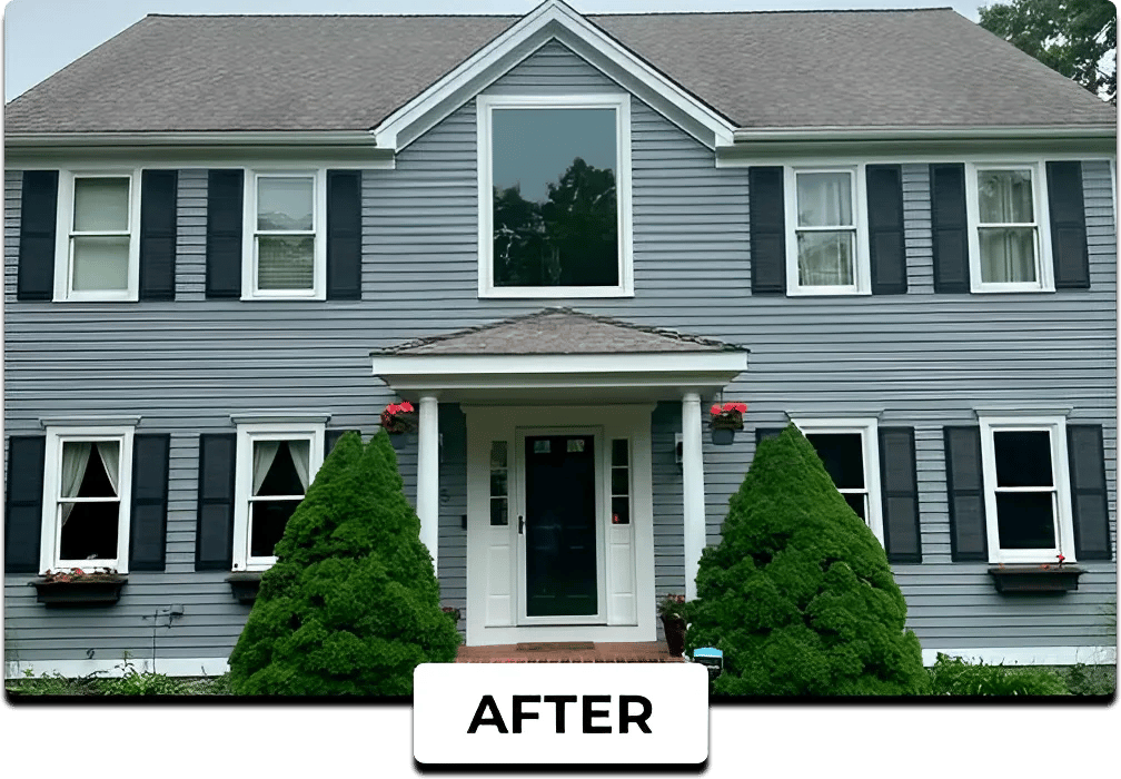 A two-story home with gray siding and black shutters freshly painted by Lucena Painting, featuring a clean white trim and an inviting front entrance.