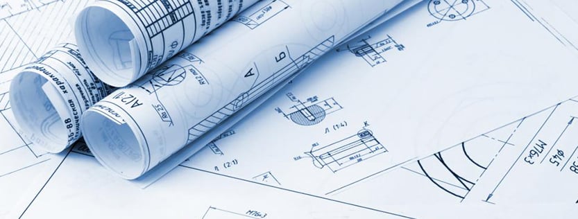 Rolled up blue print construction documents.