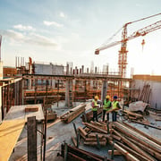 3 men on a construction site