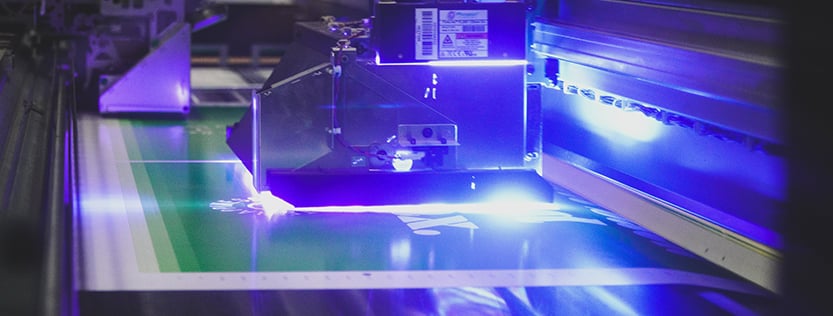 Close-up of UV light curing ink in a latex printer.
