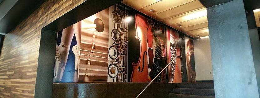 Commercial print vinyl wallcovering of classical instruments.