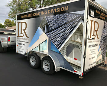 Colorful vehicle wrap on a cargo trailer