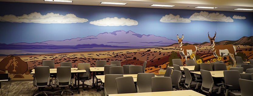 large printed wall mural of vectorized landscape and two deer.