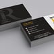 Stack of printed business cards in two variations.