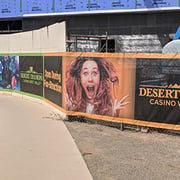 Construction site fence wraps in color