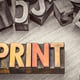 Stylized graphic showing the word PRINT using printer blocks.