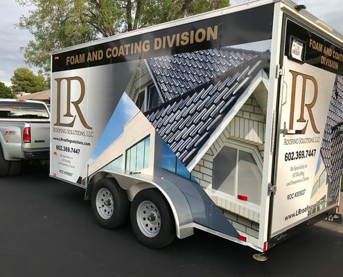 Vehicle graphics on a trailer for LR Roofing