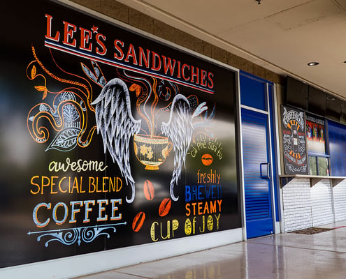 Color printed storefront signage for Lee's Sandwiches
