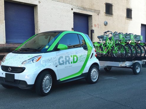 Printed vehicle wraps on GRID car and bicycles