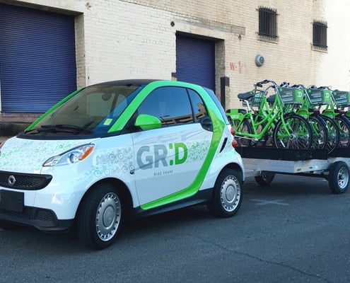 Printed vehicle wraps on GRID car and bicycles