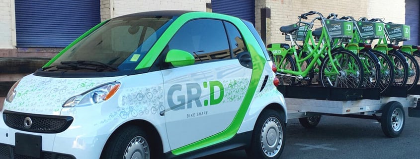 Printed vehicle wraps on GRID car and bicycles