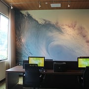 Large wall graphic behind several desks