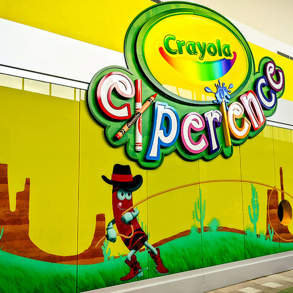 Large colorful wall signage for the Crayola Experience.