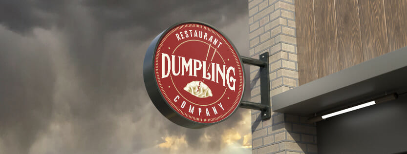 dark red restaurant weatherproof sign "dumpling" attached to building with a thunderstorm in the background