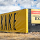 Vinyl fence banner wrap and construction sign for Jokake Construction.