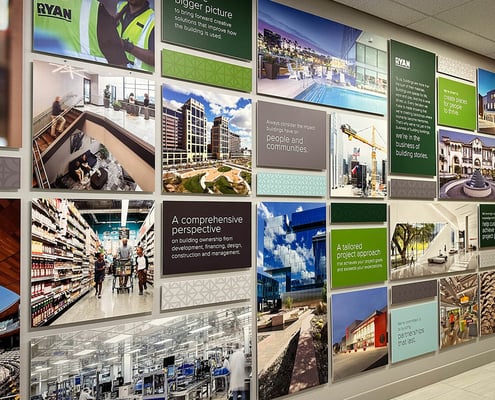 Large wall with multiple printed images and graphics