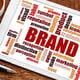 Branding graphic with brand-related key phrases.