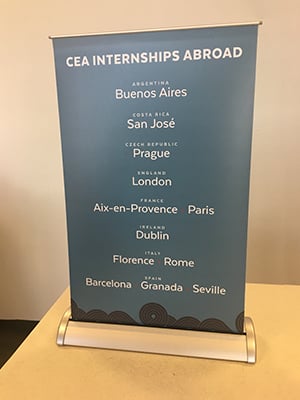 A tabletop mini retractable banner for CEA Internships Abroad.