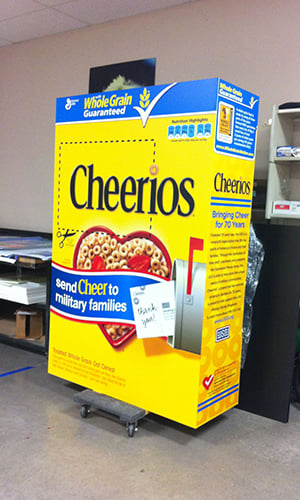 Oversized custom printed and cut Cheerios cereal box.